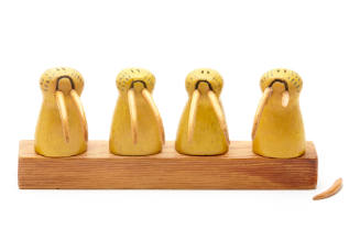 4 walrus head mounted on wood base
