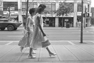 untitled (women walking in front of tank) from the series On and Around James Street