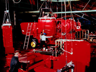 ON: Brantford - Massey Ferguson farm implement factory production line turning out self-propelled combines